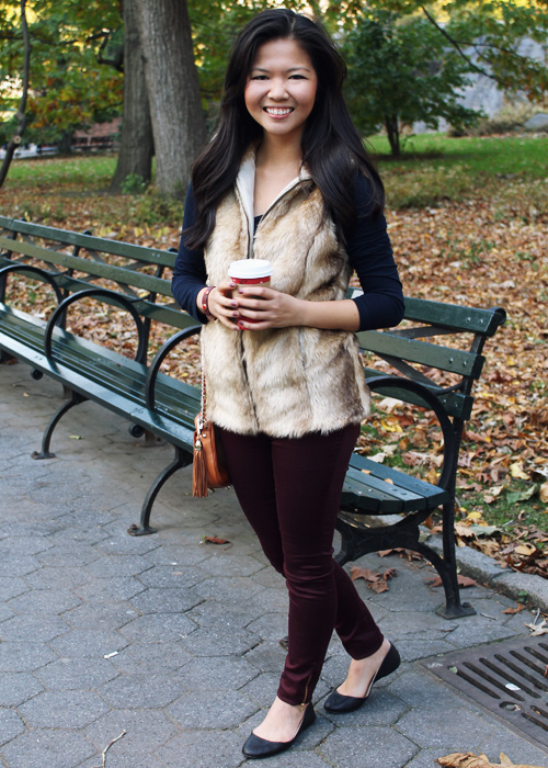 Jenny in Jacquard; NYC fashion blogger; style blog; outfit photos; Joe Fresh navy long sleeve t-shirt; Zara Girl tan fur vest; Zara oxblood maroon burgundy skinny jeans; Rebecca Minkoff cognac brown BF crossbody bag; Starbucks holiday cup; Zara black leather flat