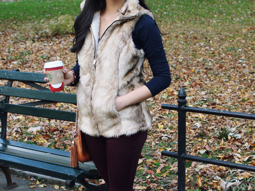 Jenny in Jacquard; NYC fashion blogger; style blog; outfit photos; Joe Fresh navy long sleeve t-shirt; Zara Girl tan fur vest; Zara oxblood maroon burgundy skinny jeans; Rebecca Minkoff cognac brown BF crossbody bag; Starbucks holiday cup; Zara black leather flat