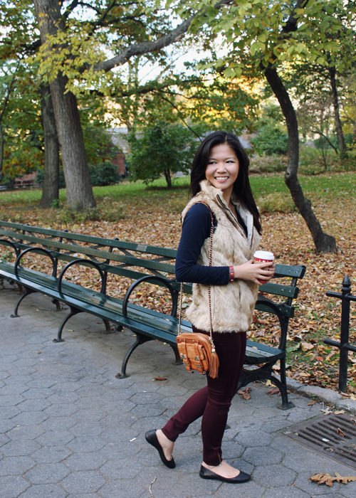 Jenny in Jacquard; NYC fashion blogger; style blog; outfit photos; Joe Fresh navy long sleeve t-shirt; Zara Girl tan fur vest; Zara oxblood maroon burgundy skinny jeans; Rebecca Minkoff cognac brown BF crossbody bag; Starbucks holiday cup; Zara black leather flat