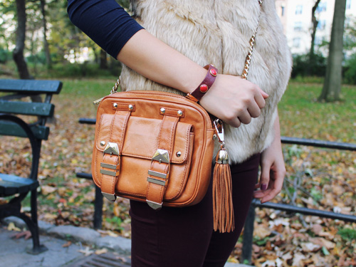 Jenny in Jacquard; NYC fashion blogger; style blog; outfit photos; Joe Fresh navy long sleeve t-shirt; Zara Girl tan fur vest; Zara oxblood maroon burgundy skinny jeans; Rebecca Minkoff cognac brown BF crossbody bag; Starbucks holiday cup; Zara black leather flat