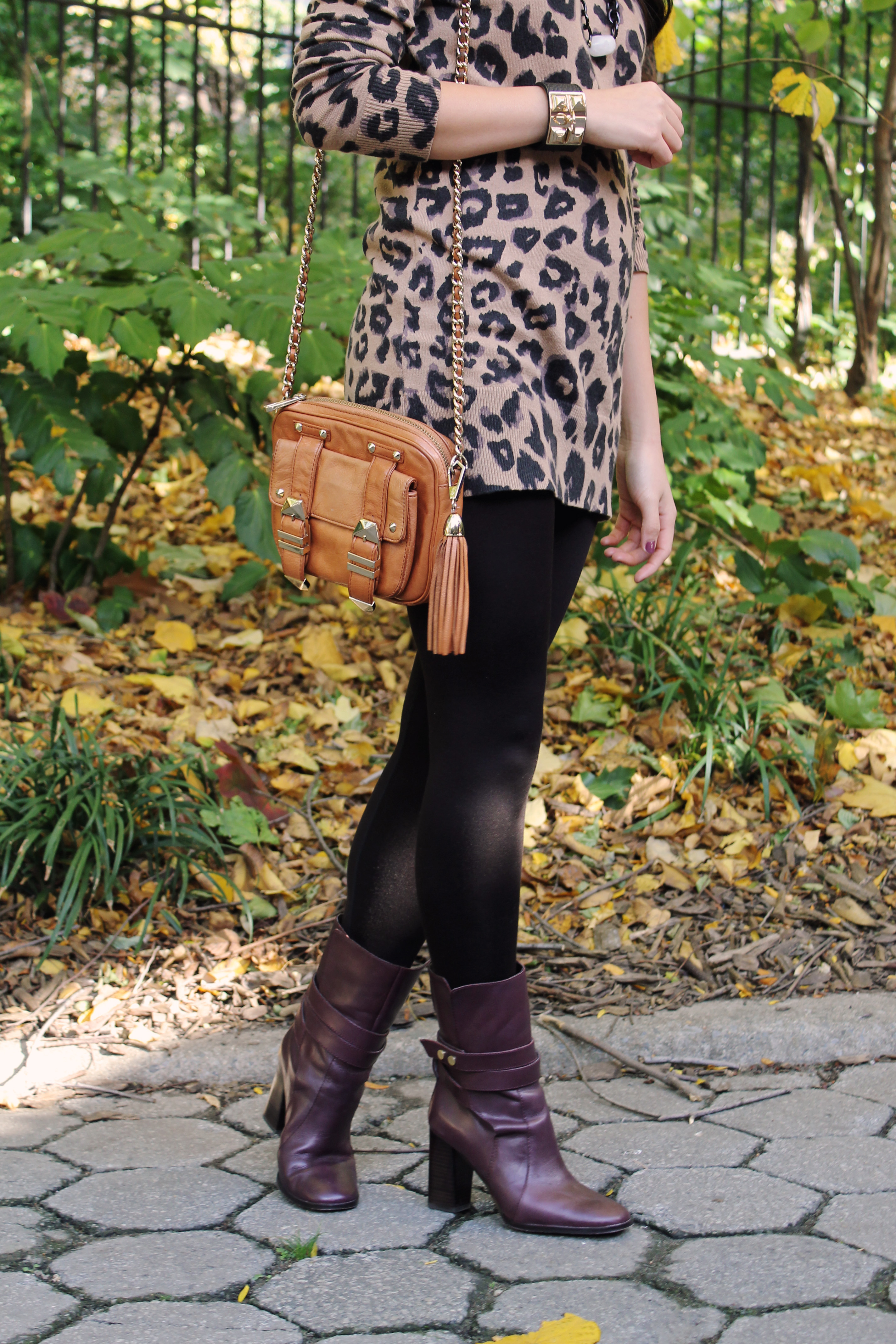 Jenny in Jacquard; NYC fashion blogger; style blog; outfit photos; fall fashion; Old Navy leopard sweater dress; Uniqlo HeatTech black leggings; Spike the Punch Madelyn black chain necklace; Diane von Furstenburg DVF Yardley maroon burgundy oxblood boots; Rebecca Minkoff cognac brown BF crossbody bag; Joe Fresh black gold Hermes-inspired cuff