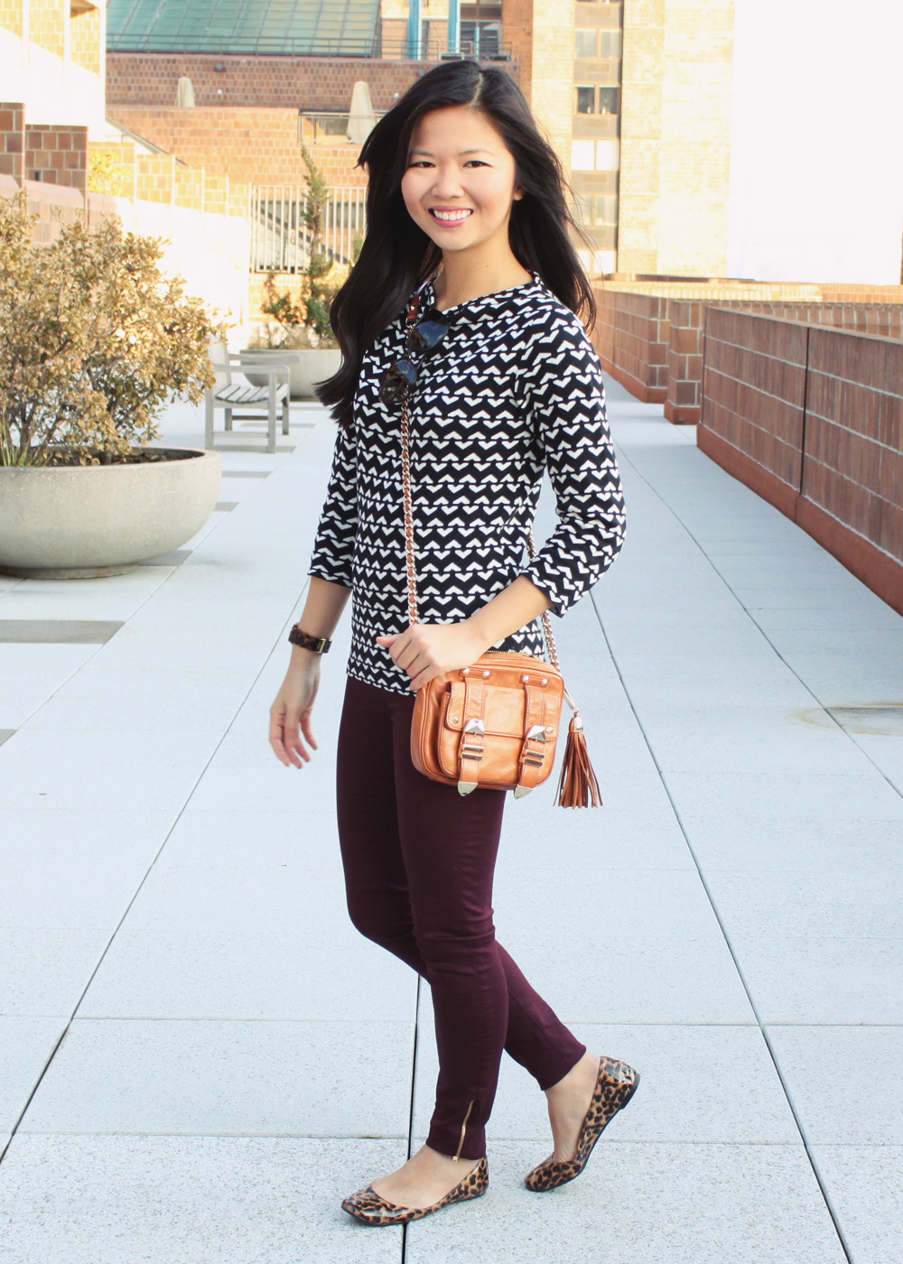 Jenny in Jacquard; NYC fashion blogger; style blog; outfit photos; how to swear oxblood; Joe Fresh black and white printed sweater; Zara oxblood ankle zip skinny jeans; Dolce & Gabanna cateye sunglasses; Rebecca Minkoff BF crossbody bag in cognac; Michael Kors tortoise gold boyfriend watch; Steve Madden patent leopard flats