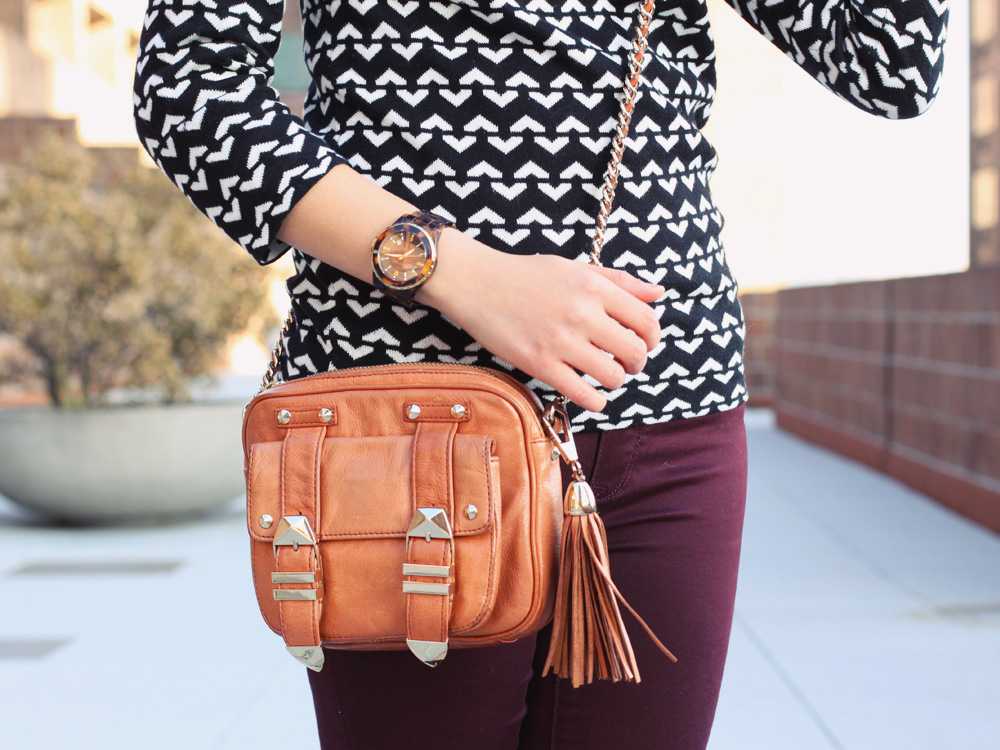 Jenny in Jacquard; NYC fashion blogger; style blog; outfit photos; how to swear oxblood; Joe Fresh black and white printed sweater; Zara oxblood ankle zip skinny jeans; Dolce & Gabanna cateye sunglasses; Rebecca Minkoff BF crossbody bag in cognac; Michael Kors tortoise gold boyfriend watch; Steve Madden patent leopard flats