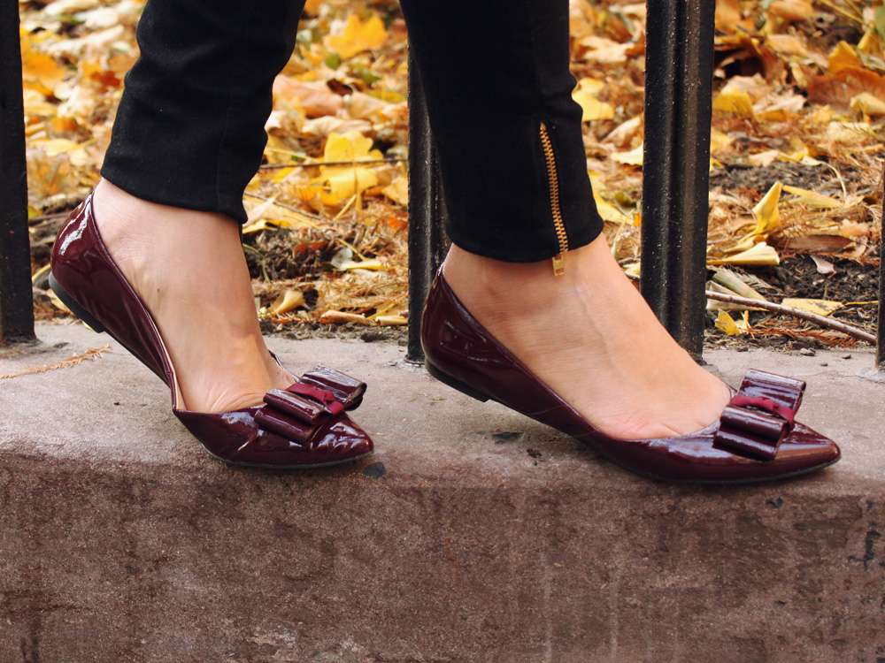 Jenny in Jacquard; NYC fashion blogger; style blog; outfit photos; Old Navy black and white polka dot sweater; Zara black skinny jeggings; Kate Spade black and white striped Scout crossbody bag; KTownsend Etsy black and gold bangles; ShoeMint Hilary bow flat in oxblood; Michael Kors tortoise gold boyfriend watch