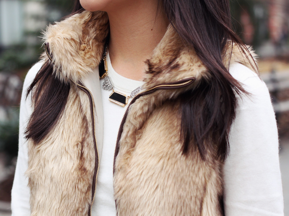 Jenny in Jacquard; NYC fashion blogger; style blog; outfit photo; Zara Kids girl's faux fur vest; C. Wonder creme crew neck sweater; Zara black skinny legging jeans with zip; Sequin necklace; C. Wonder calf hair skinny bangle; Juicy Couture stretch pyramid pave bracelet; Coach Legacy Penny cross body bag in cognac; Kate Spade New York Licorice polka dot pumps