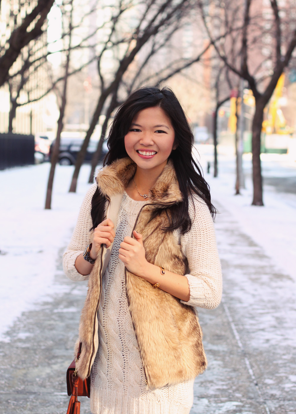 Jenny in Jacquard; NYC fashion blogger; style blog; outfit photo; winter outfit; Zara cream sweater knit dress; Zara Girl faux fur vest; Forever 21 maroon oxblood leggings; Sperry Top-Sider x J.Crew Shearwater snow boots; Coach Legacy Penny crossbody bag in cognac; Michael Kors tortoise gold boyfriend watch; Sequin heart necklace