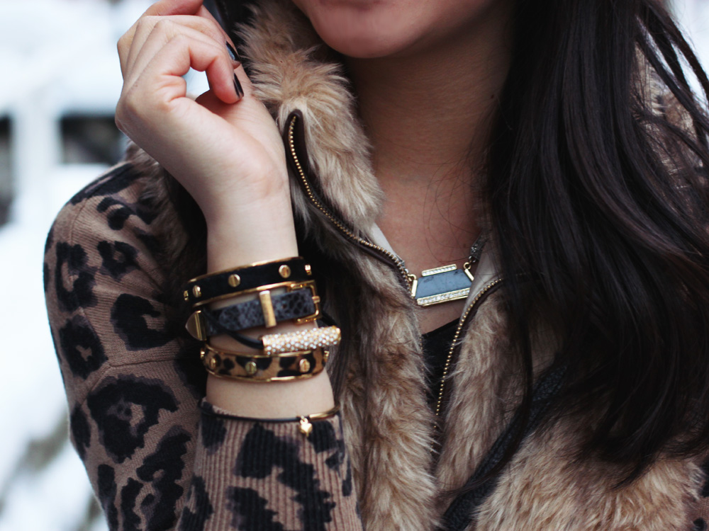 Skirt the Rules; NYC fashion blogger; style blog; winter outfit photos; Banana Republic black wool coat; Zara Girls faux fur vest; Old Navy leopard sweater dress; Uniqlo HeatTech leggings; Hunter shearling lined rain boots; Sequin geometric necklace; C. Wonder skinny cuffs; Juicy Couture pave pyramid bracelet; DVF black crossbody bag
