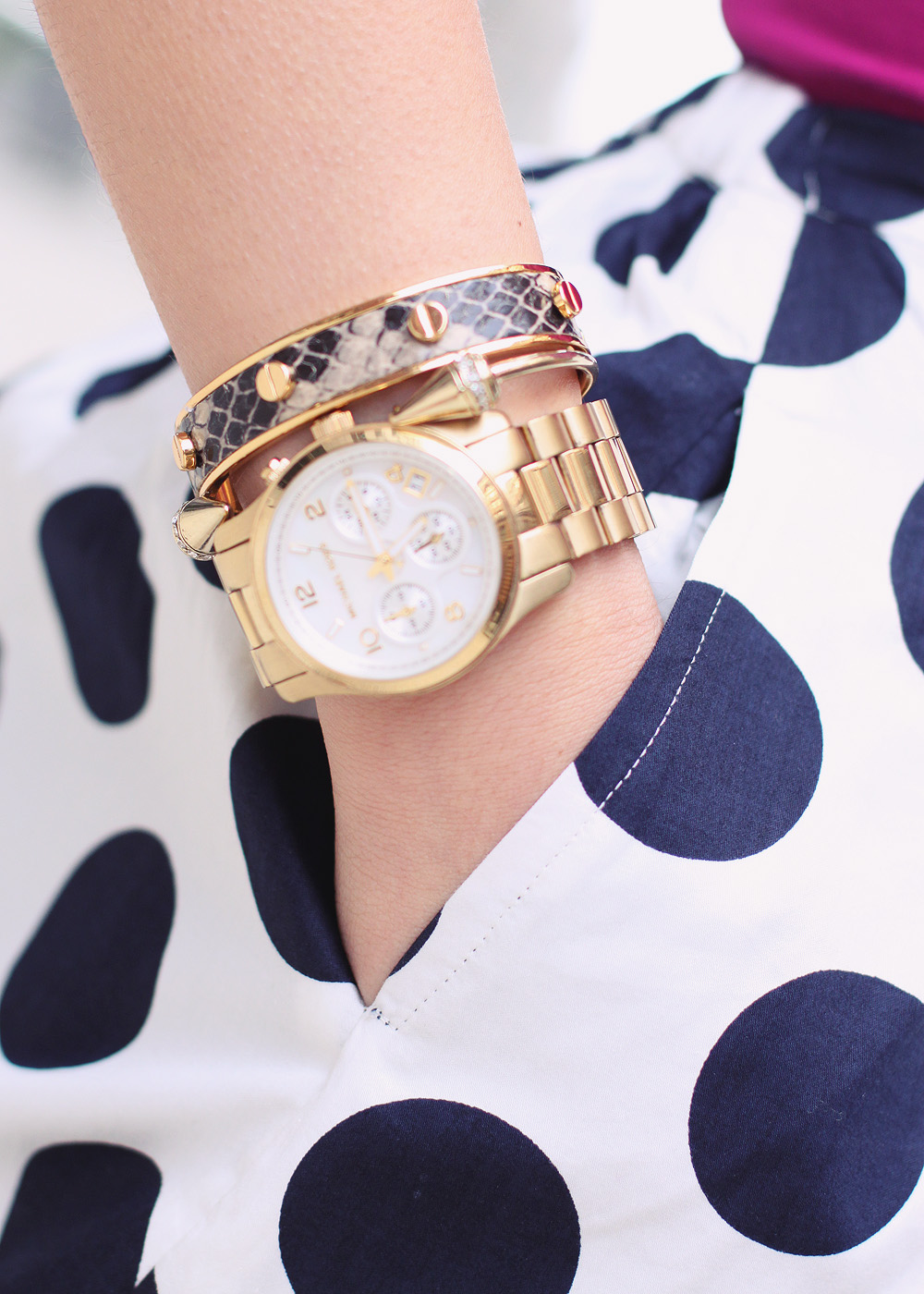 Skirt The Rules Blog; NYC fashion blogger; style blog; spring outfit photos; Topshop fuschia peplum top; J.Crew Factory Crew Cuts polka dot skirt; JewelMint jeweled collar necklace; Michael Kors gold mother of pearl boyfriend watch; BaubleBar arrow bangle; C. Wonder snakeskin skinny bracelet; J.Crew turquoise stretch bracelet; Kate Spade City Stripe Sidney tote bag; Pour La Victoire Mai patent leather wedge pump