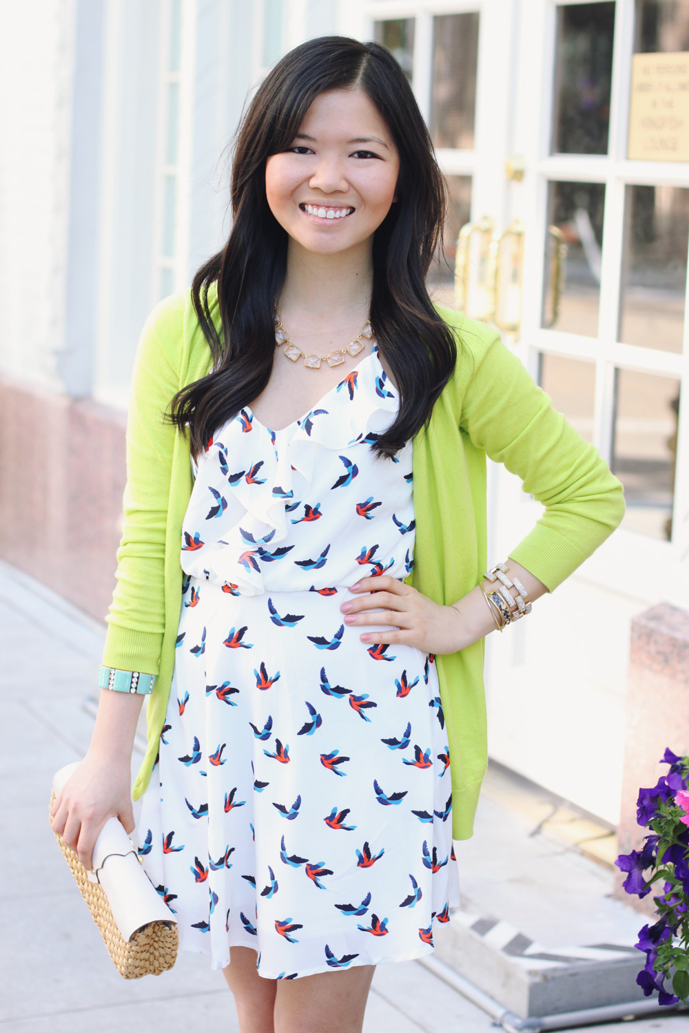 Skirt The Rules Blog; NYC fashion blogger; style blog; spring outfit photo; Gap Luxlight V Neck Neon Cardigan; Bird Print Dress; Michael Kors leather straw clutch; C. Wonder crystal necklace; J.Crew turquoise stretch bracelet; J.Crew pave square link bracelet; C. Wonder snakeskin skinny cuff; BaubleBar arrow cuff; Madewell Broadway brown leather sandals