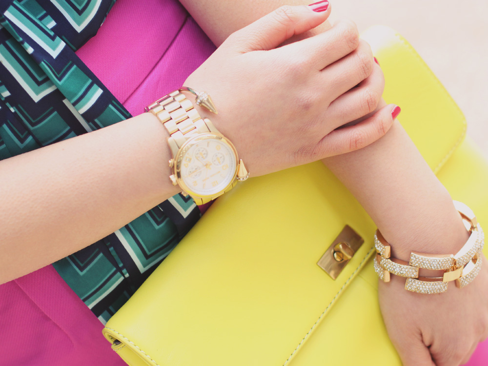 Skirt The Rules Blog; NYC fashion blogger; style blog; spring outfit photos; Banana Republic Factory turquoise print bow blouse; J.Crew Factory Pencil Skirt in Double Serge Cotton; J.Crew Pave Square Link Bracelet; Michael Kors gold mother of pearl boyfriend watch; J.Crew Factory Vero Clutch in neon yellow; J.Crew Mona nude pump