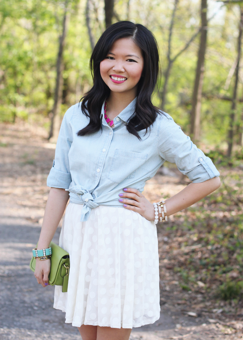 Skirt The Rules Blog; NYC fashion blogger; style blog; spring outfit photo; J.Crew Factory chambray shirt; Lulu's white polka dot dress; BaubleBar pink tab necklace; Coach Penny crossbody bag in lime green; J.Crew pave square link bracelet; J.Crew turquoise stretch bracelet; C. Wonder snakeskin bangle; Essie Play Date purple nail polish; Rosegold nude cut out heels