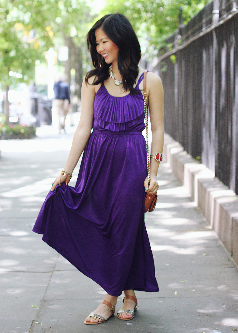 Skirt The Rules Blog; NYC fashion blogger; style blog; summer outfit photo; what to wear at a musical festival; Forever 21 purple maxi dress; BaubleBar bronze geometric necklace; Sequin pave branch necklace; Rebecca Minkoff BF brown crossbody bag; Madewell maroon bracelet; C. Wonder snakeskin skinny cuff; J.Crew orange friendship bracelet; NOLA boutique red bracelet; Target glitter sandals