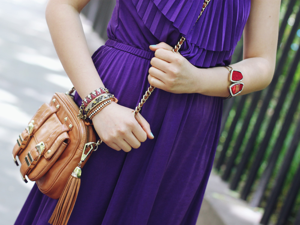 Skirt The Rules Blog; NYC fashion blogger; style blog; summer outfit photo; what to wear at a musical festival; Forever 21 purple maxi dress; BaubleBar bronze geometric necklace; Sequin pave branch necklace; Rebecca Minkoff BF brown crossbody bag; Madewell maroon bracelet; C. Wonder snakeskin skinny cuff; J.Crew orange friendship bracelet; NOLA boutique red bracelet; Target glitter sandals