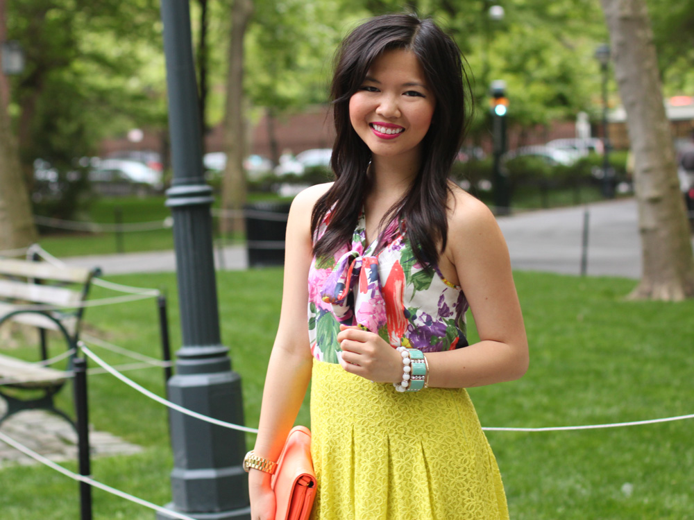 Skirt The Rules Blog; NYC fashion blogger; style blog; spring outfit photo; J.Crew floral print pussybow blouse; Anthropologie neon chartreuse lace skirt; J.Crew Factory neon rose clutch; J.Crew turquoise stretch bracelet; A Beautiful Heart white bubblegum bracelet; BaubleBar arrow cuff; Michael Kors gold boyfriend watch; Sam Edelman colorblock wedge; Essie DJ Play That Song neon purple nail polish