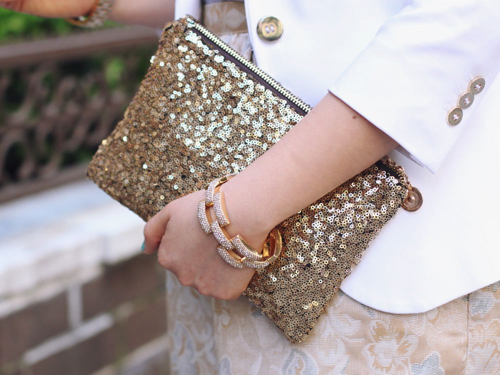 Skirt The Rules Blog; NYC fashion blogger; style blog; spring outfit photos; Zara white blazer with gold buttons; H&M gray v-neck t-shirt; Forever 21 gold gray floral skirt; Juicy Couture fringe necklace; Hello Fab gold glam clutch; J.Crew gold pave square link bracelet; Zara neon snakeskin heels with buckles; Michael Kors mother of pearl gold boyfriend watch