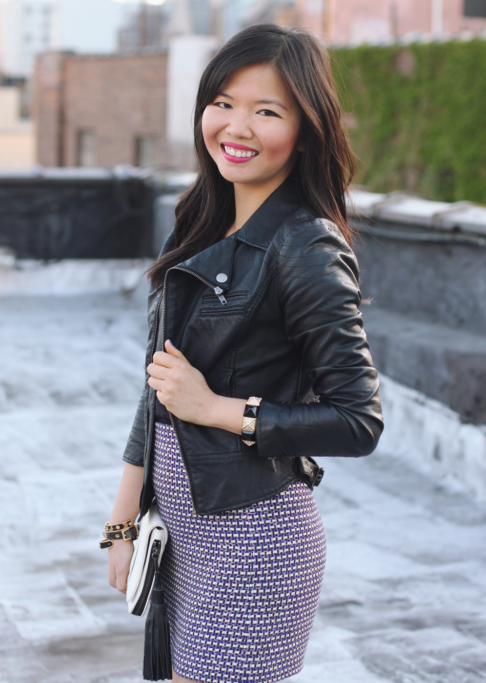 Skirt The Rules Blog; NYC fashion blogger; style blog; spring outfit photos; faux vegan leather moto jacket; H&M black v-neck t-shirt; J.Crew purple silver tweed mini skirt; L.A.M.B. black and white clutch; L.A.M.B. black strappy heels; Juicy Couture pave black stretch bracelet; C. Wonder black skinny cuff