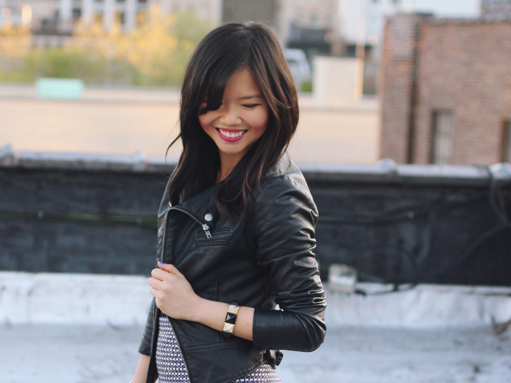 Skirt The Rules Blog; NYC fashion blogger; style blog; spring outfit photos; faux vegan leather moto jacket; H&M black v-neck t-shirt; J.Crew purple silver tweed mini skirt; L.A.M.B. black and white clutch; L.A.M.B. black strappy heels; Juicy Couture pave black stretch bracelet; C. Wonder black skinny cuff