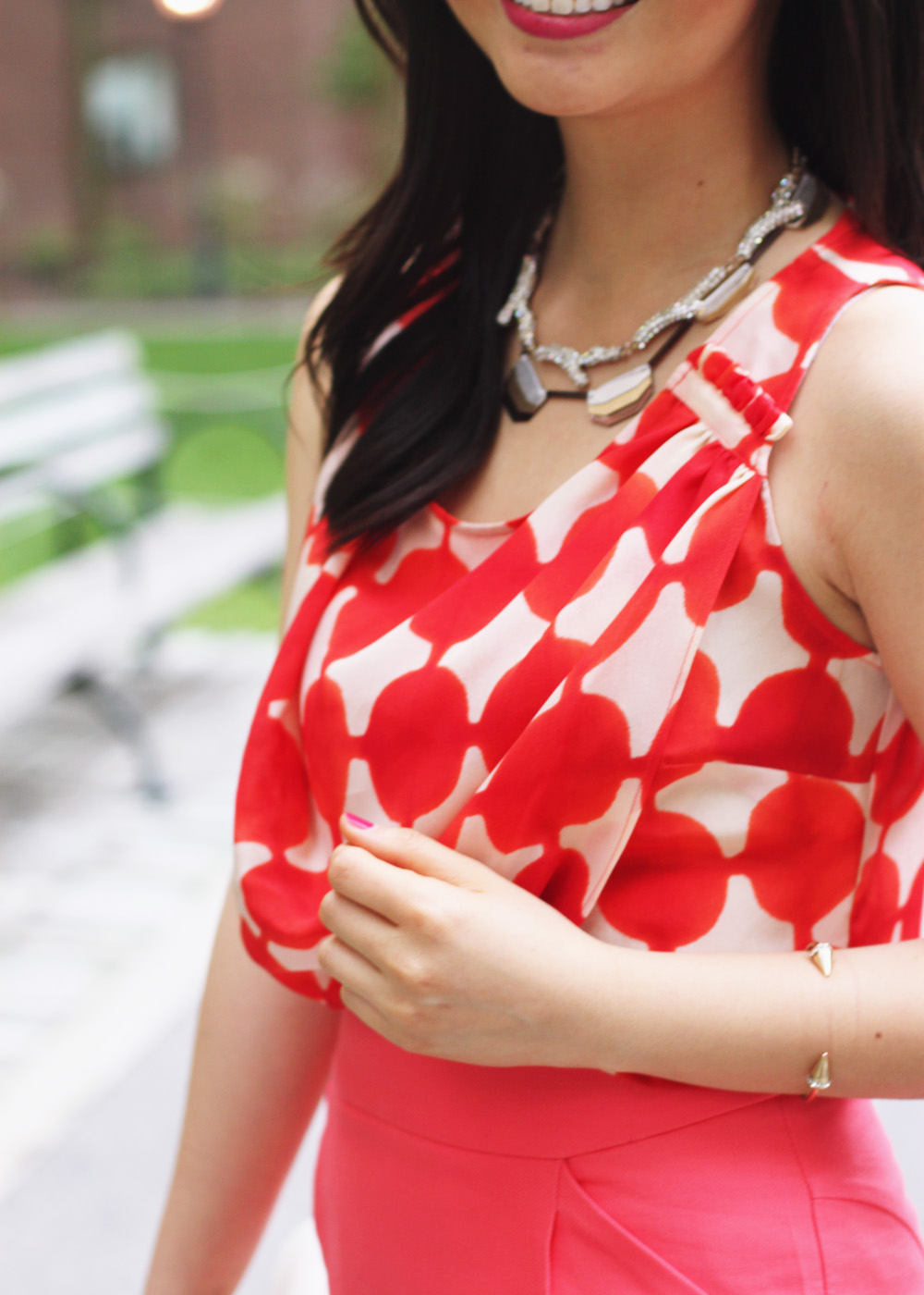 Skirt The Rules Blog; NYC fashion blogger; style blog; spring outfit photos; Fashion 4 Ways; Anthropologie orange print blouse; J.Crew Factory neon rose No. 2 Pencil Skirt; BaubleBar bronze geometric necklace; Sequin pave branch necklace; Michael Kors white leather straw clutch; J.Crew pave square link bracelet; Sam Edelman Sophie wedge