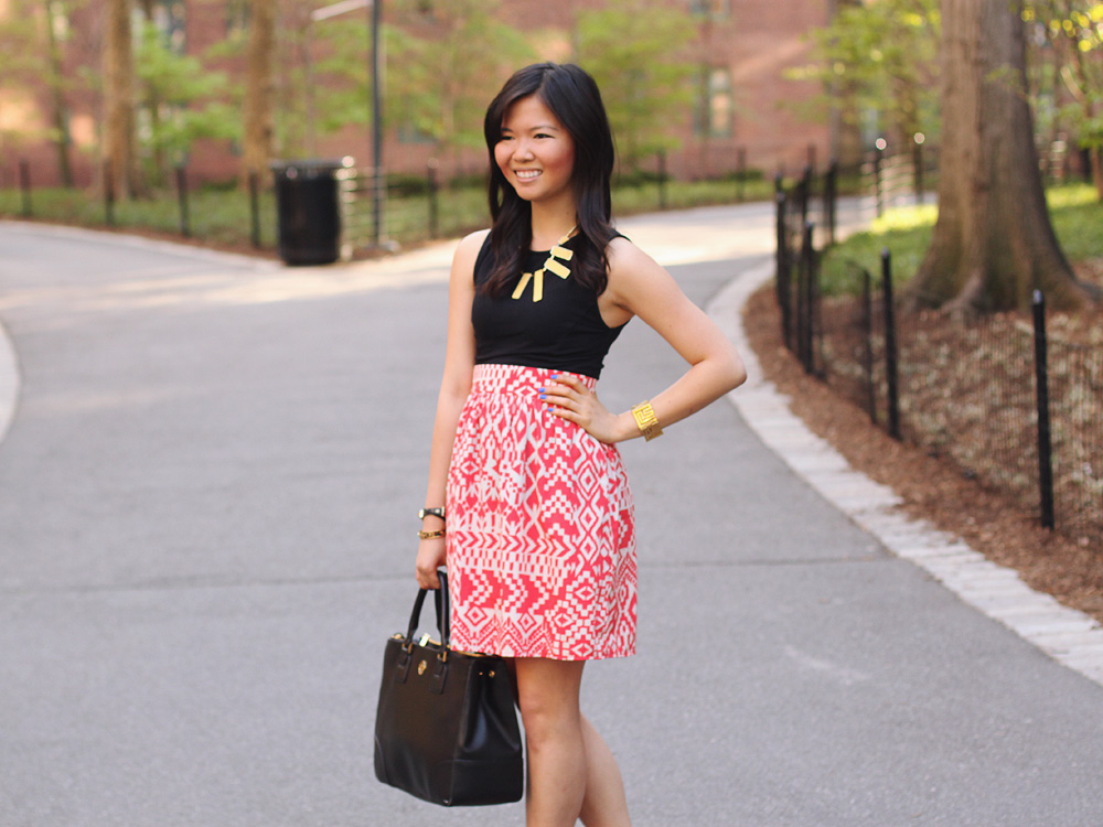 Skirt The Rules Blog; NYC fashion blogger; style blog; spring outfit photo; Topshop sleeveless top; tribal print skirt; rectangular yellow necklace; Juicy Couture pave bracelet; Essie cobalt blue Butler Please nail polish; Tory Burch Robinson satchel tote; CC Skye geometric gold bracelet; Sam Edelman black and brown colorblock wedge