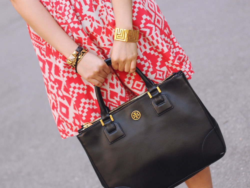 Skirt The Rules Blog; NYC fashion blogger; style blog; spring outfit photo; Topshop sleeveless top; tribal print skirt; rectangular yellow necklace; Juicy Couture pave bracelet; Essie cobalt blue Butler Please nail polish; Tory Burch Robinson satchel tote; CC Skye geometric gold bracelet; Sam Edelman black and brown colorblock wedge