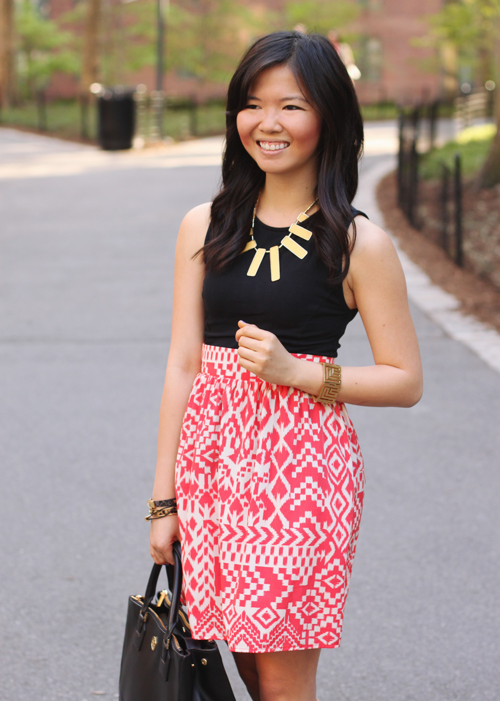 Skirt The Rules Blog; NYC fashion blogger; style blog; spring outfit photo; Topshop sleeveless top; tribal print skirt; rectangular yellow necklace; Juicy Couture pave bracelet; Essie cobalt blue Butler Please nail polish; Tory Burch Robinson satchel tote; CC Skye geometric gold bracelet; Sam Edelman black and brown colorblock wedge