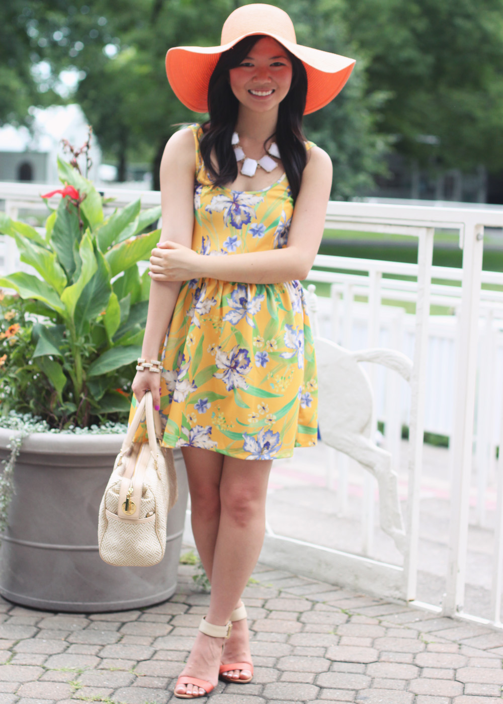 Skirt The Rules Blog; NYC fashion blogger; style blog; summer outfit photo; what to wear to a derby or horse race; Zara TRF neon yellow floral print dress; Joe Fresh orange floppy hat; Banana Republic sparkle stone white statement necklace; Tory Burch straw satchel handbag; J.Crew pave square link bracelet; Sam Edelman Sophie colorblock wedge; Essie DJ Play That Song neon purple nail polish