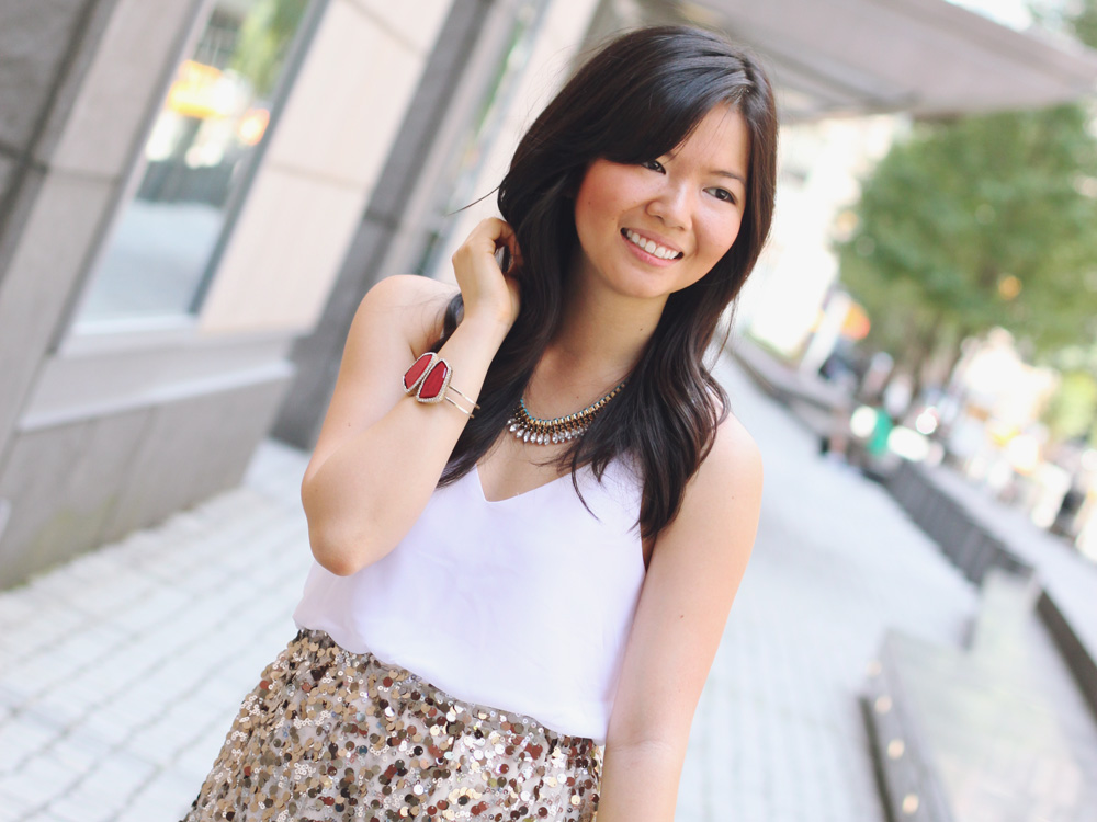 Skirt The Rules Blog; NYC fashion blogger; style blog; summer outfit photo; Tobi Square One white chiffon tank dress; Joe Fresh gold sequin a-line skirt; T&J Designs teardrop highlighter necklace; J.Crew Factory Vero neon yellow clutch; red gemstone bracelet; C. Wonder snakeskin skinny cuff; Zara snakeskin and neon heels with buckles