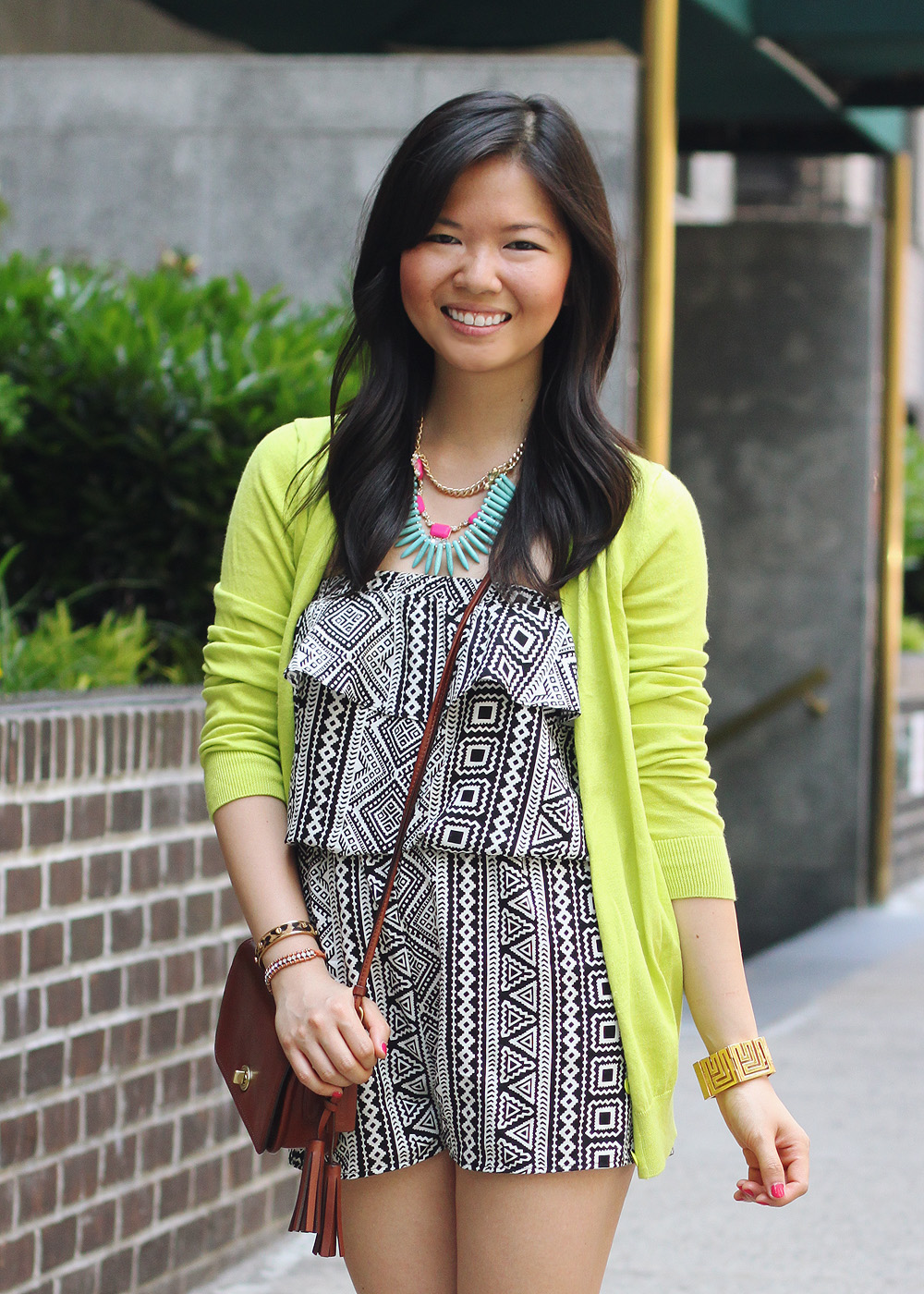 Skirt The Rules Blog; NYC fashion blogger; style blog; summer outfit photo; black and white tribal romper; Gap Luxe Light neon green cardigan; Courtney Kerr x Bauble Bar Neon Alaqua tribal statement necklace; CC Skye geometric gold bracelet; Coach Legacy Penny brown crossbody bag; C. Wonder leopard calf hair skinny bangle; Sam Edelman Sophie black and brown colorblock wedges