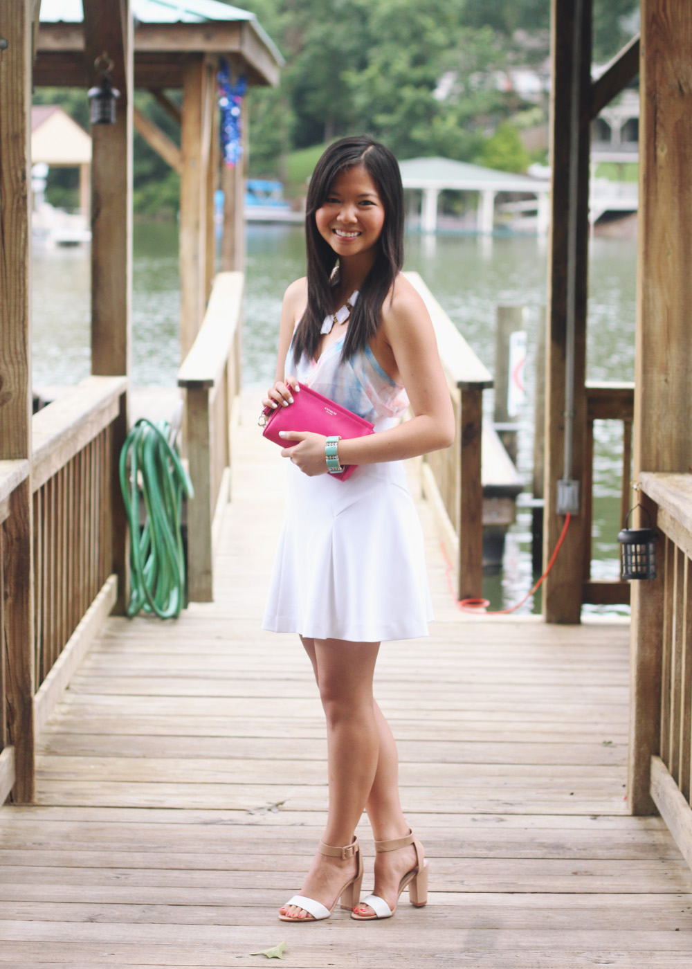 Skirt The Rules Blog; NYC fashion blogger; style blog; summer outfit photos; Gentle Fawn Citizen peach sky pastel tank; Express white flare skirt; Banana Republic sparkle stone white statement necklace;  Coach Legacy Leather Large Wristlet; J.Crew turquoise stretch bracelet; Derng rosegold pave link bracelet; Zara white beige colorblock heel