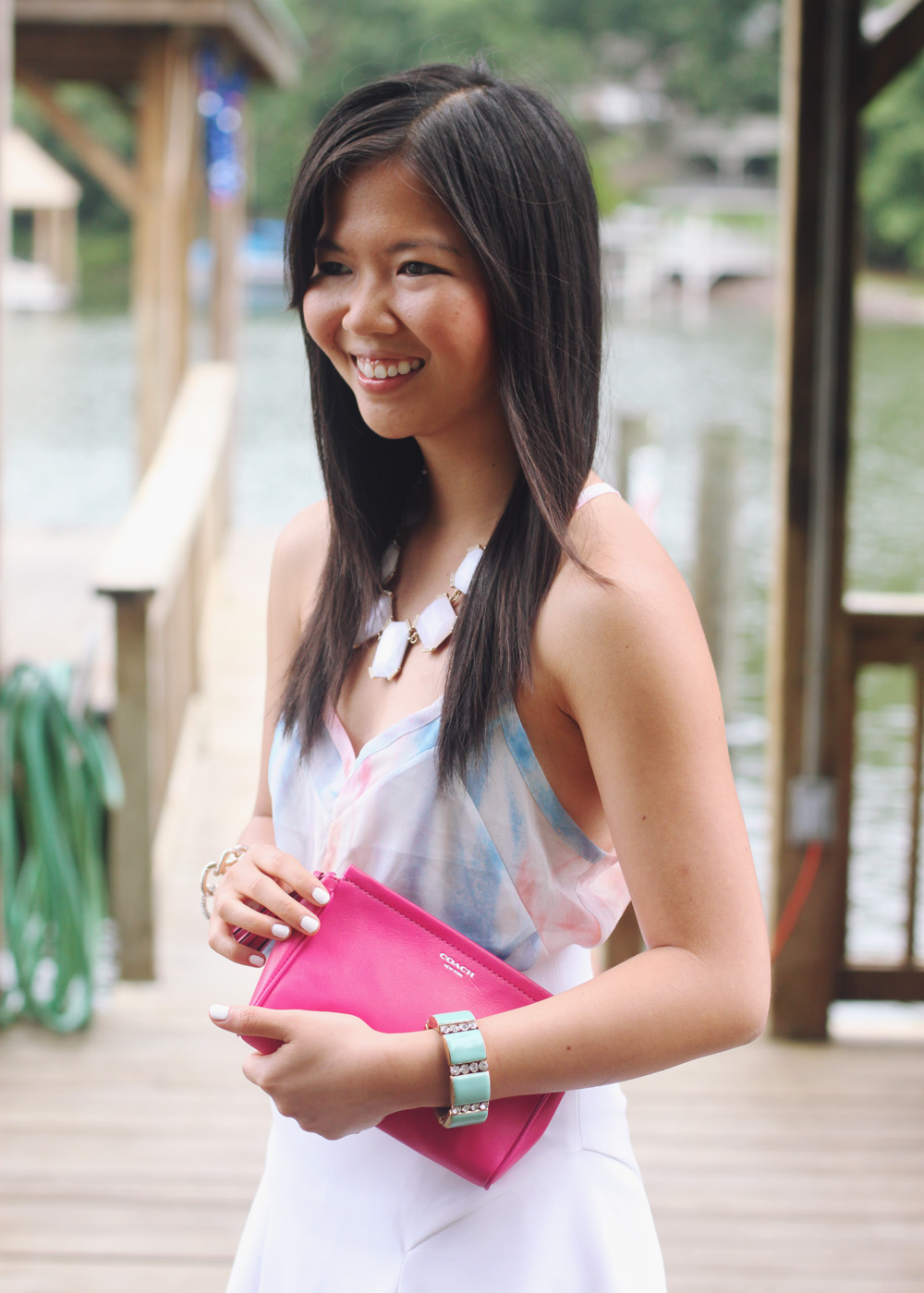 Skirt The Rules Blog; NYC fashion blogger; style blog; summer outfit photos; Gentle Fawn Citizen peach sky pastel tank; Express white flare skirt; Banana Republic sparkle stone white statement necklace;  Coach Legacy Leather Large Wristlet; J.Crew turquoise stretch bracelet; Derng rosegold pave link bracelet; Zara white beige colorblock heel