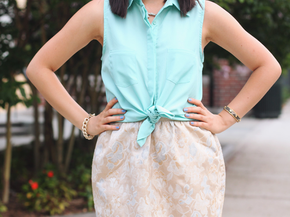 Skirt The Rules Blog; NYC fashion blogger; style blog; summer outfit photo; Tobi mint green sleeveless button up top; Forever 21 gold jacquard skirt; Sequin pave branch necklace; Brighthouse Baubles bracelet; Michael Kors white leather straw clutch; ShoeMint Elizabeth nude lace up heels