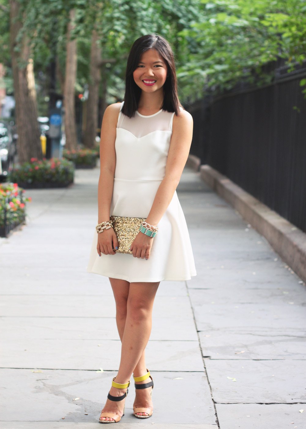 Skirt The Rules Blog; NYC fashion blogger; style blog; summer outfit photos; Lulu*s Go With The Bow Little White Dress; Hello Fab Gold Glam Sequin Clutch; J.Crew Pave Square Link Bracelet; Derng Rose Gold Chain Bracelet; Brighthouse Baubles Chain Bracelet; Zara Neon Snakeskin Heels