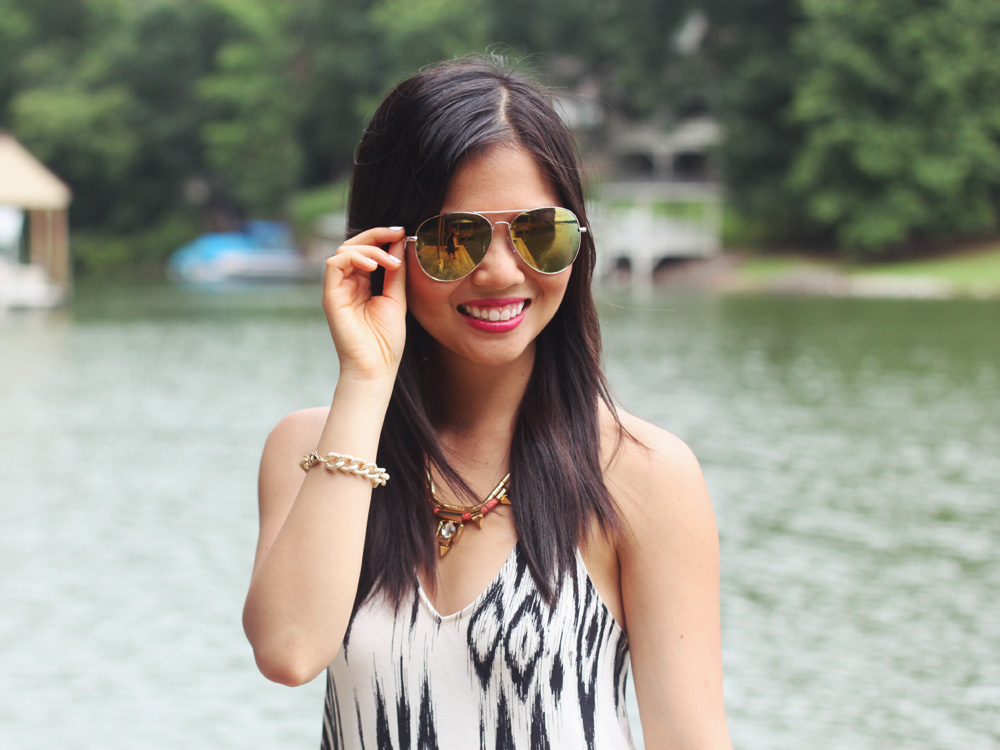 Skirt The Rules Blog; NYC fashion blogger; style blog; summer outfit photo; H&M ikat tribal summer dress; H&M mirrored aviator sunglasses; Courtney Kerr x BaubleBar Cerise Arrowhead statement necklace; Brighthouse Baubles gold link bracelet; J.Crew square pave link bracelet; Zara white beige colorblock heel