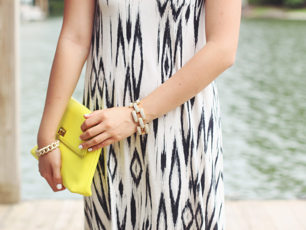 Skirt The Rules Blog; NYC fashion blogger; style blog; summer outfit photo; H&M ikat tribal summer dress; H&M mirrored aviator sunglasses; Courtney Kerr x BaubleBar Cerise Arrowhead statement necklace; Brighthouse Baubles gold link bracelet; J.Crew square pave link bracelet; Zara white beige colorblock heel