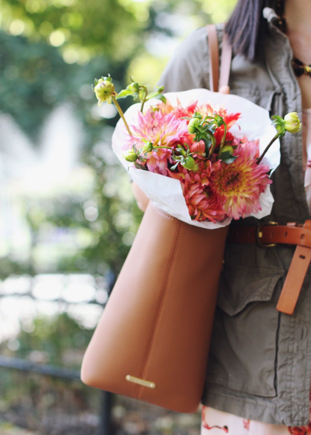 Skirt The Rules Blog; NYC fashion blogger; style blog; fall outfit photo; how to wear a summer dress for fall; Gap military utility jacket; coral floral summer dress; J.Crew cognac brown belt; Gigi Saddle Taylor Tote; Sam Edelman Sophia black and brown wedge; C. Wonder leopard calf hair skinny cuff