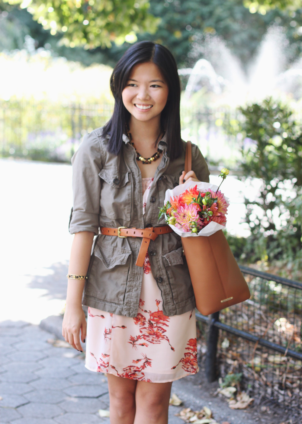 Skirt The Rules Blog; NYC fashion blogger; style blog; fall outfit photo; how to wear a summer dress for fall; Gap military utility jacket; coral floral summer dress; J.Crew cognac brown belt; Gigi Saddle Taylor Tote; Sam Edelman Sophia black and brown wedge; C. Wonder leopard calf hair skinny cuff