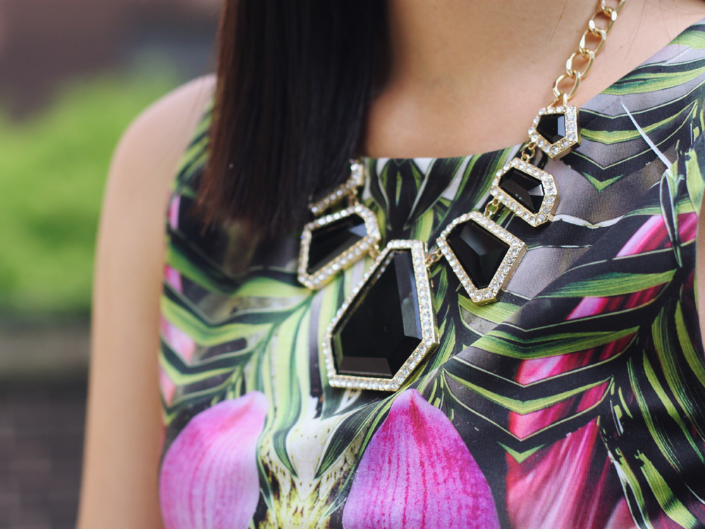 Skirt The Rules Blog; NYC fashion blogger; style blog; fall outfit photo;  Le Tote mirrored floral dress worn as top; Kirna Zabete x Target leather a-line skirt; BaubleBar black geometric statement necklace; J.Crew Factory Vero neon yellow clutch; L.A.M.B. black cut out heels
