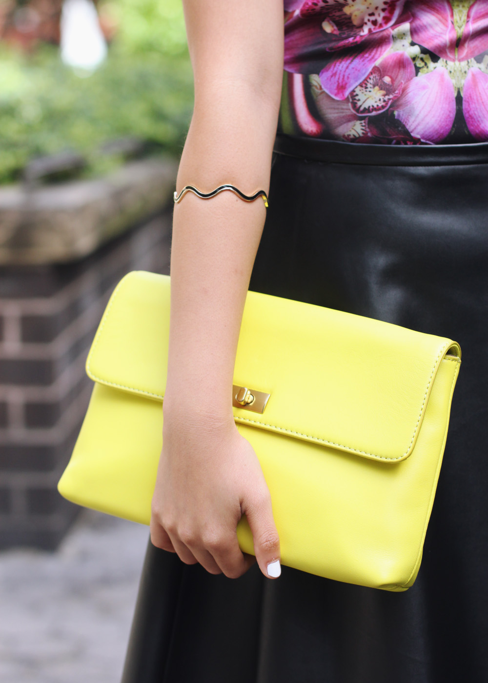 Skirt The Rules Blog; NYC fashion blogger; style blog; fall outfit photo;  Le Tote mirrored floral dress worn as top; Kirna Zabete x Target leather a-line skirt; BaubleBar black geometric statement necklace; J.Crew Factory Vero neon yellow clutch; L.A.M.B. black cut out heels