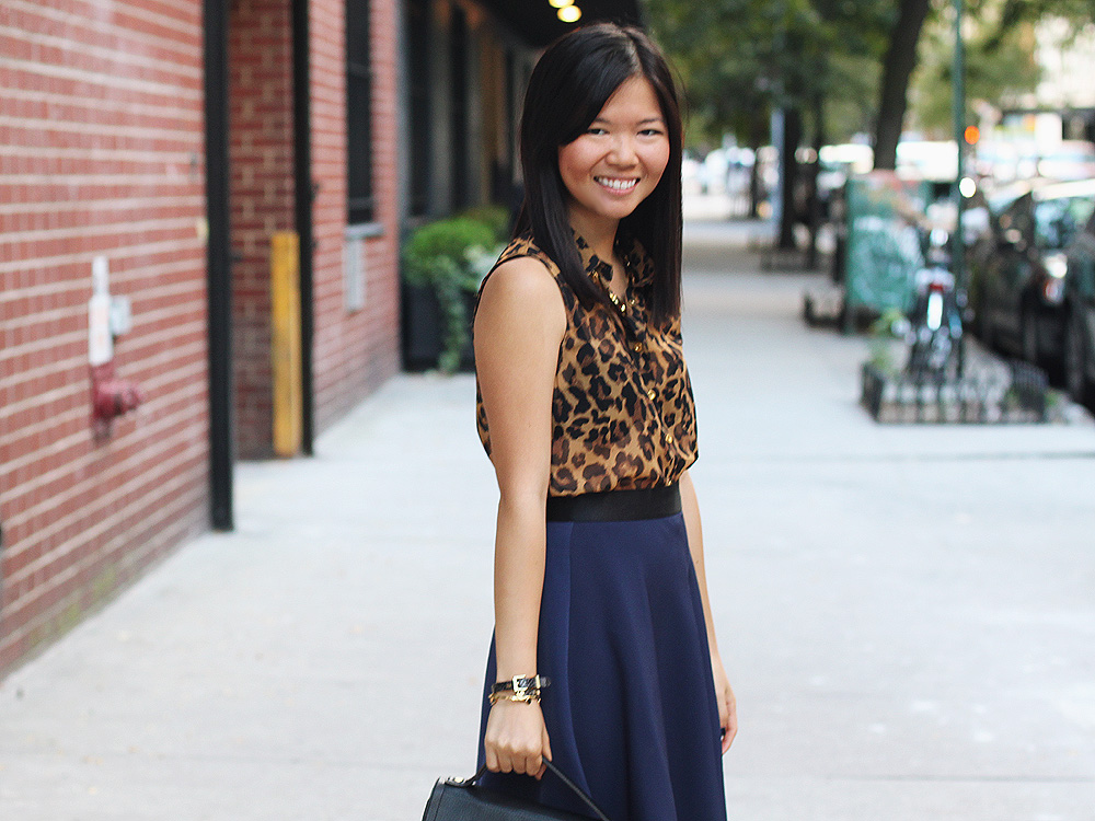 Skirt The Rules Blog; NYC fashion blogger; style blog; fall outfit photo; leopard sleeveless blouse; 3.1 Phillip Lim x Target navy skirt; 3.1 Phillip Lim black satchel; C. Wonder tortoise link necklace; C. Wonder snakeskin skinny bangle; Gorjana & Griffin alphabet disc bracelet; Juicy Couture pave pyramid bracelet; Pour La Victoire Mai patent black wedge pumps