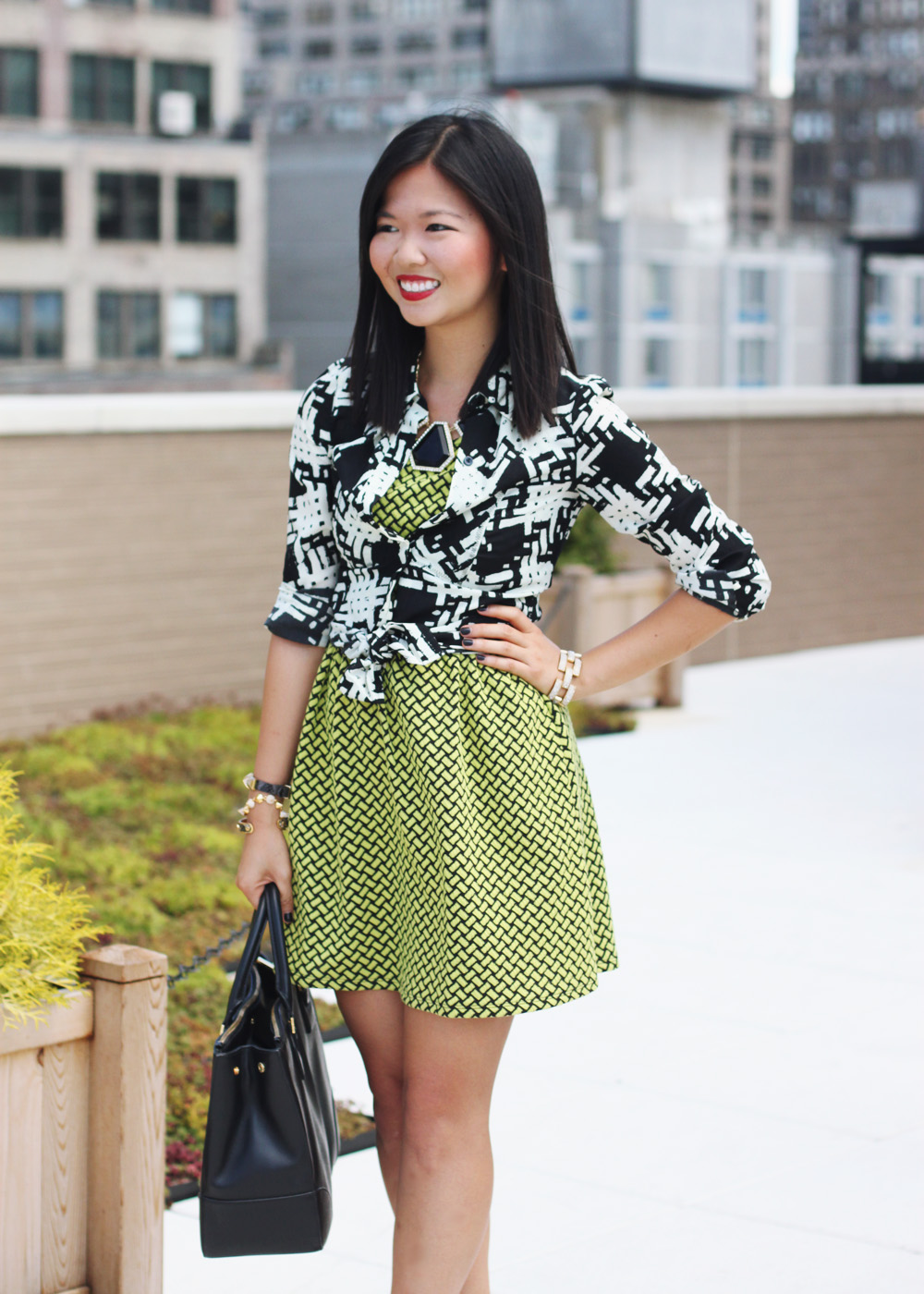 Skirt The Rules Blog; NYC fashion blogger; style blog; fall outfit photo; how to mix prints for fall; Rachel by Rachel Roy graphic print blouse; Forever 21 neon black textured dress; Tory Burch Robinson satchel tote; Juicy Couture pave pyramid leather bracelet; C. Wonder snakeskin skinny bangle cuff; CC Skye Mercy Princess bracelet; J.Crew pave square link bracelet; L.A.M.B black strappy heels