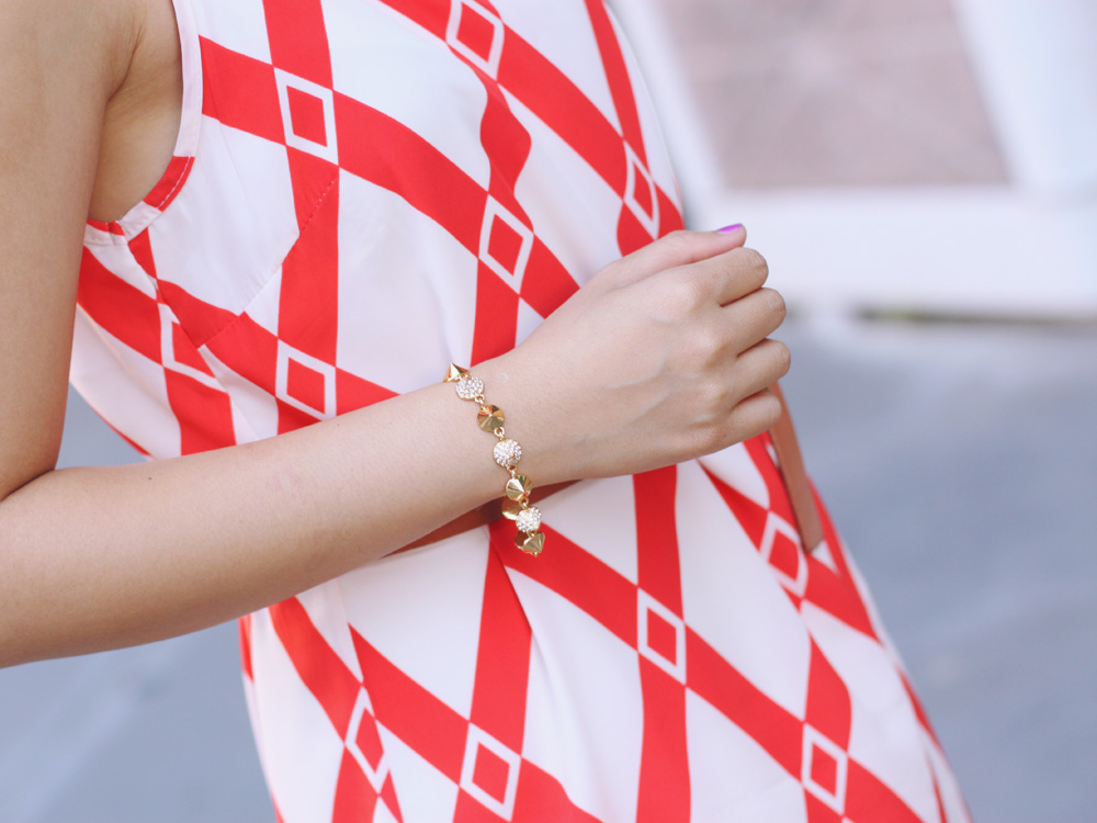 Skirt The Rules Blog; NYC fashion blogger; style blog; summer outfit photos; Le Tote Orange Graphic Dress; Courtney Kerr x BaubleBar Neon Alaqua tribal statement necklace; J.Crew brown belt; Coach Candace carryall tote in camel; CC SKYE Mercy Princess gold pave cone bracelet; Dolce Vita Helia gold chevron sandal wedges