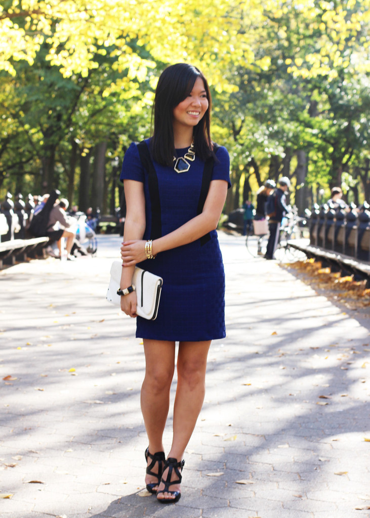 Skirt The Rules Blog; NYC fashion blogger; style blog; how to wear black and blue; Topshop textured contrast panel black and blue dress; BaubleBar black geometric necklace; LAMB black and white clutch; Forever 21 gold geometric necklace; Juicy Couture pave pyramid stretch bracelet; LAMB black strappy heels