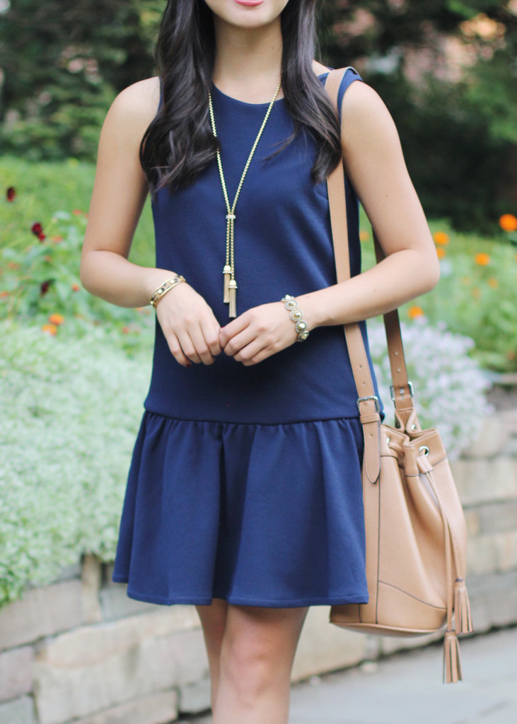 Gold Tassel Necklace & Camel Tassel Bucket Bag