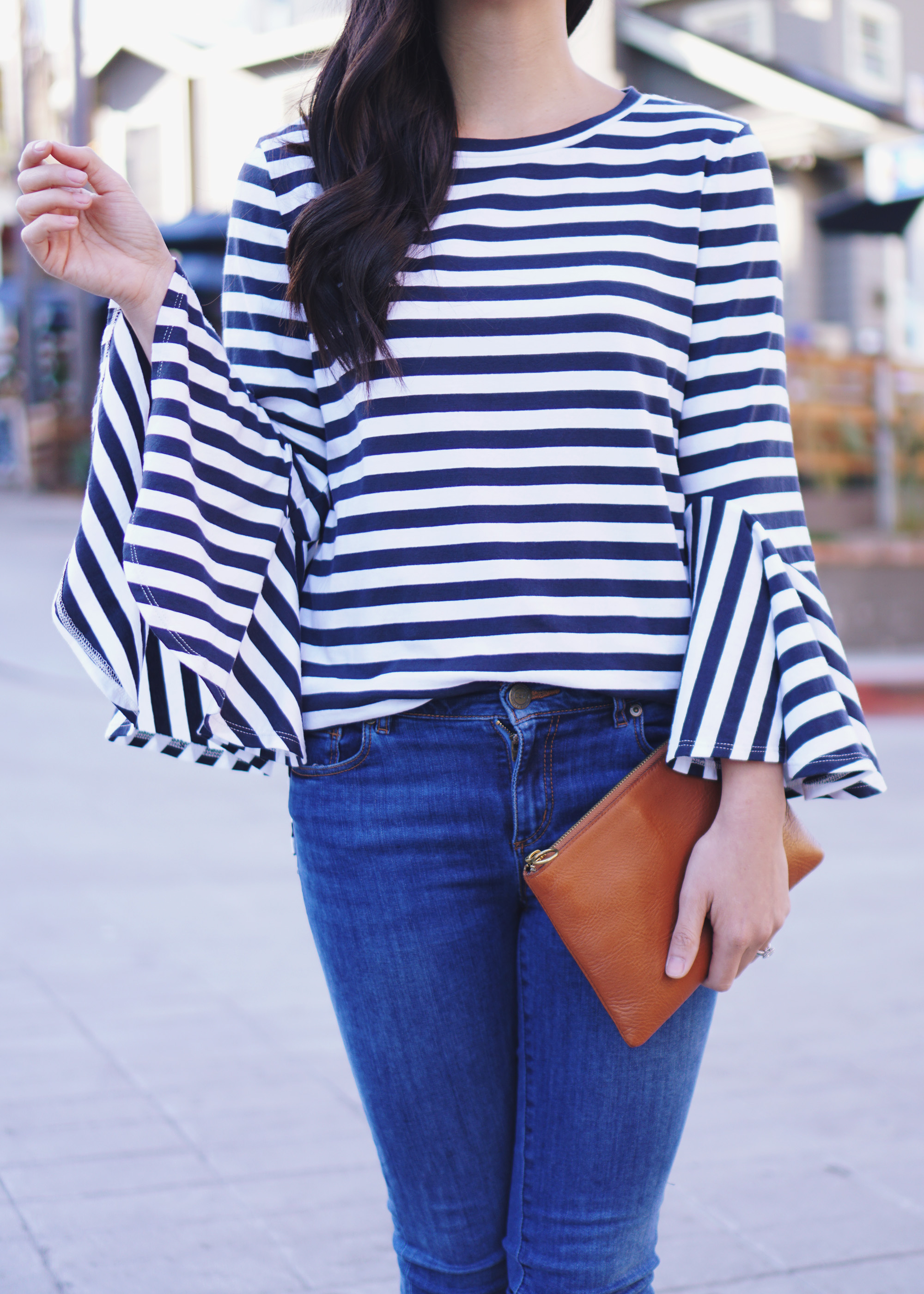 Striped Bell Sleeve Top & Brown Leather Clutch