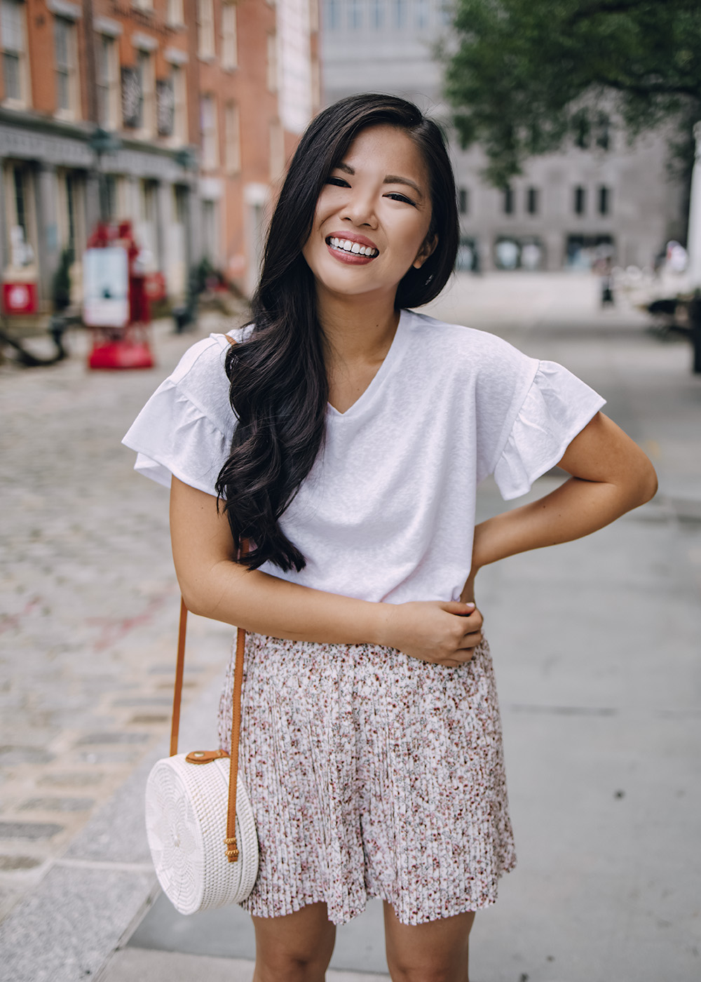 Casual Summer Outfit Ideas for Women: White Ruffle T-Shirt and Floral Shorts